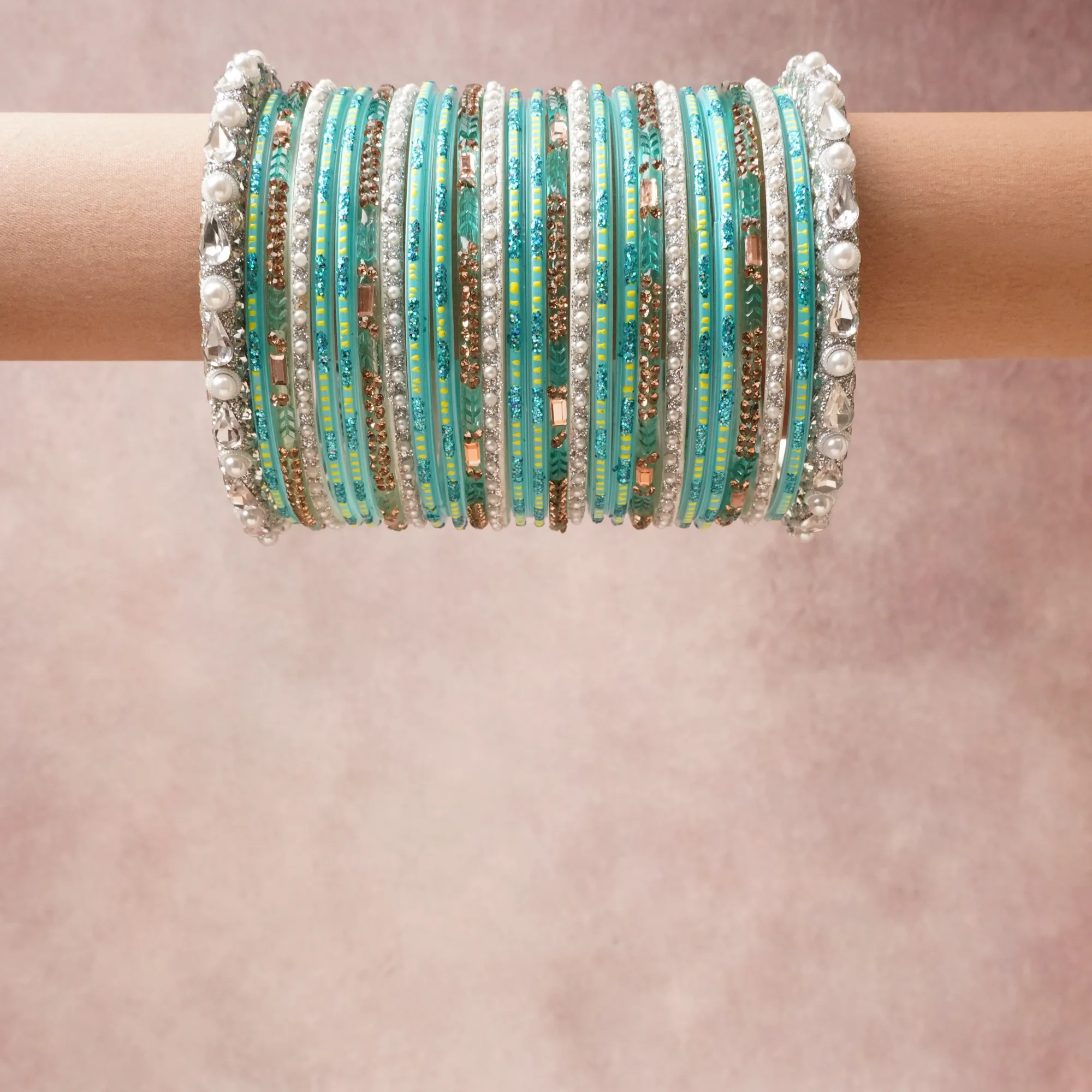 A grounding Pastel Blue forms the heart of the set, while touches of Lime Green, Light Blue Glitter add charm.

A thoughtful composition of Metal Alloy, Rhinestones, Faux Pearls, Glass, Enamel, designed to feel complete without being heavy.
Each element layers seamlessly, creating a look that is refined, wearable and quietly striking.